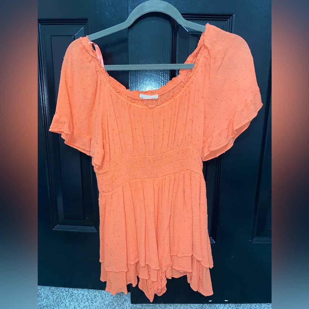Off orange and pink type color. Altard state romper. Super cute and barley worn